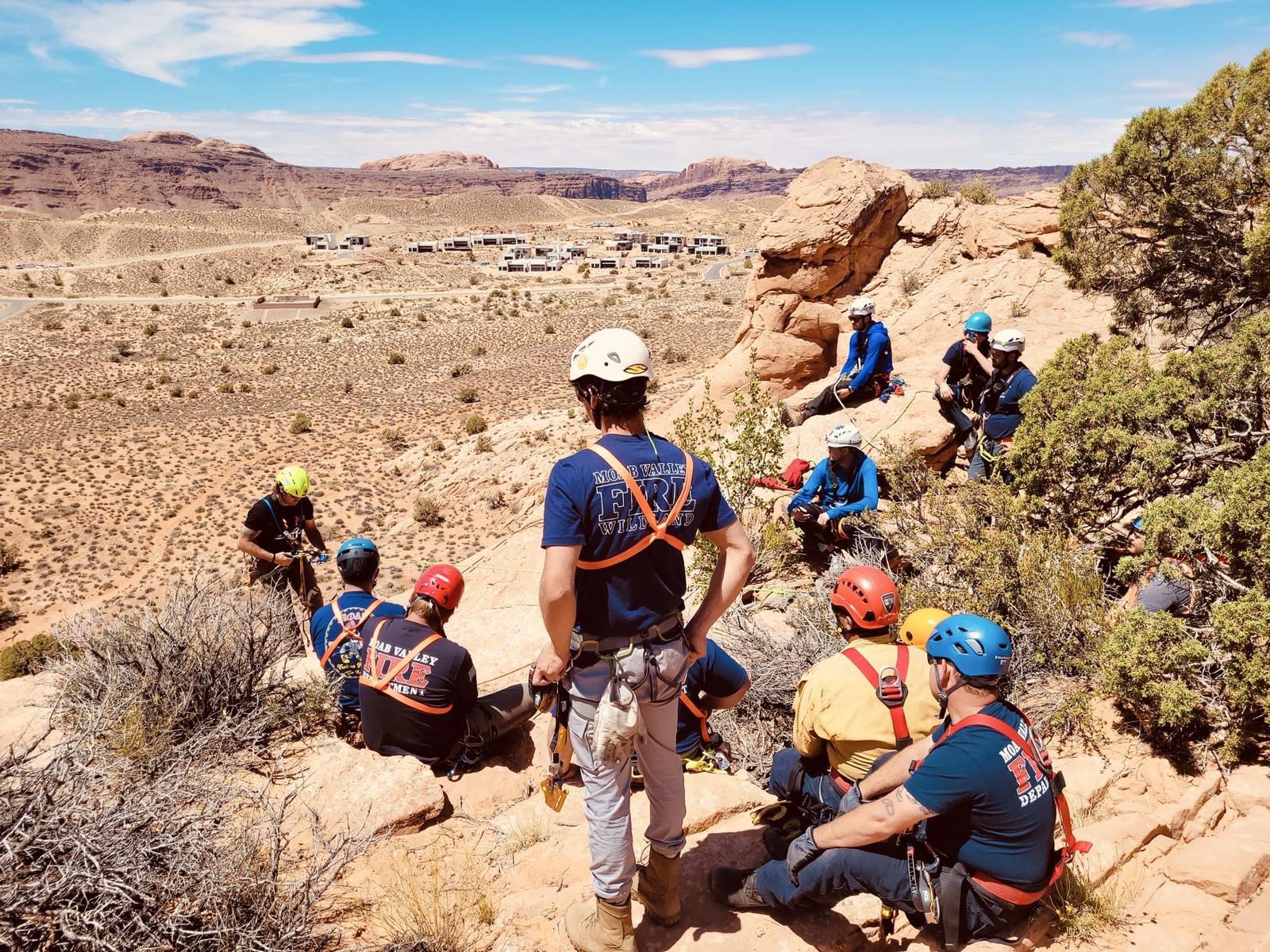 Rope rescue team training in desert terrain
