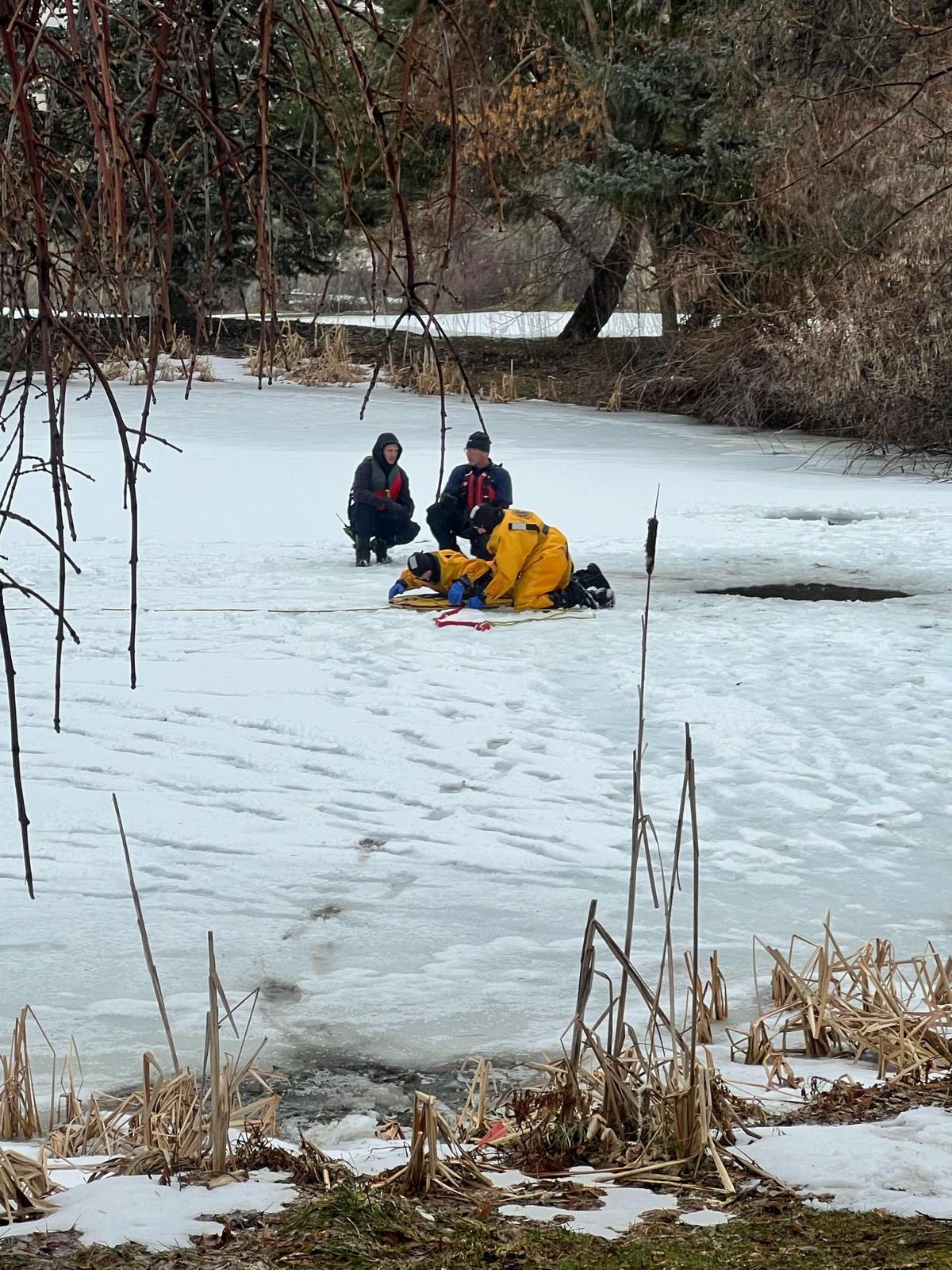 Ice rescue scenario with victim in hole
