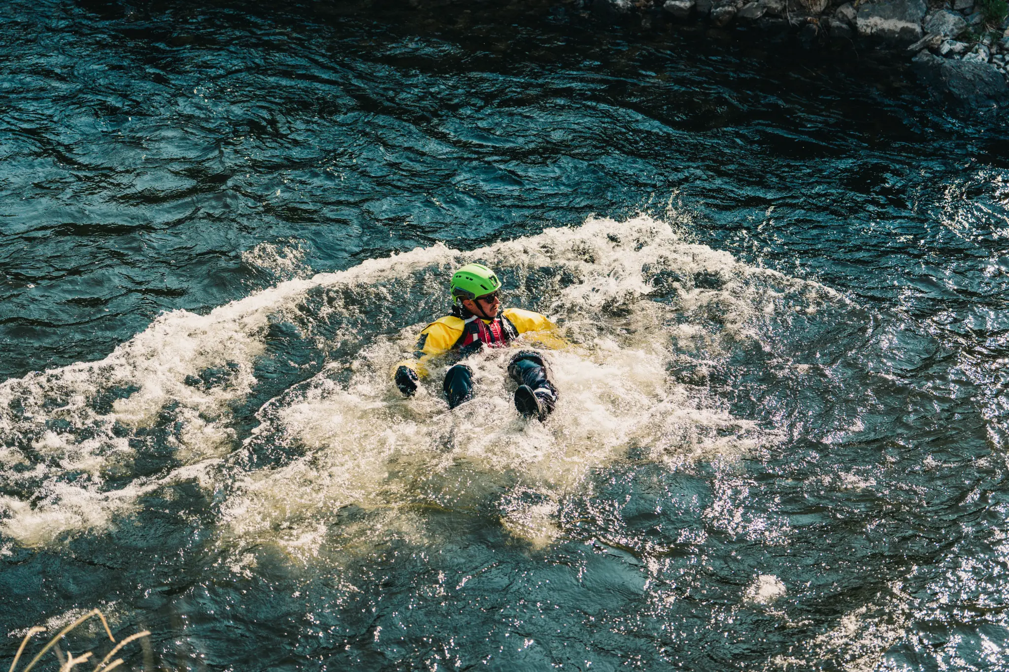 Surface water rescue training - swimmer in whitewater