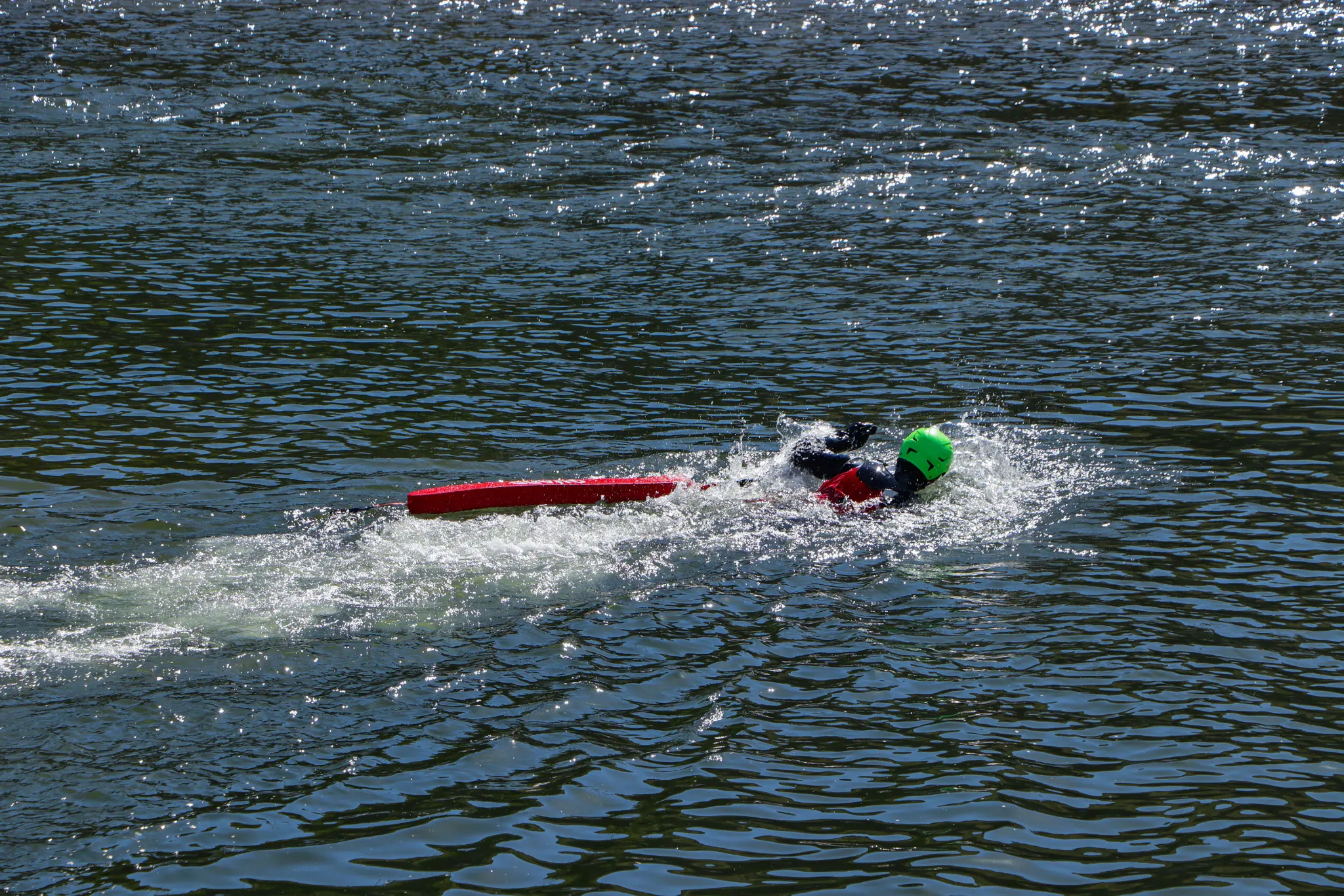 Surface water rescue training - swimmer with rescue board