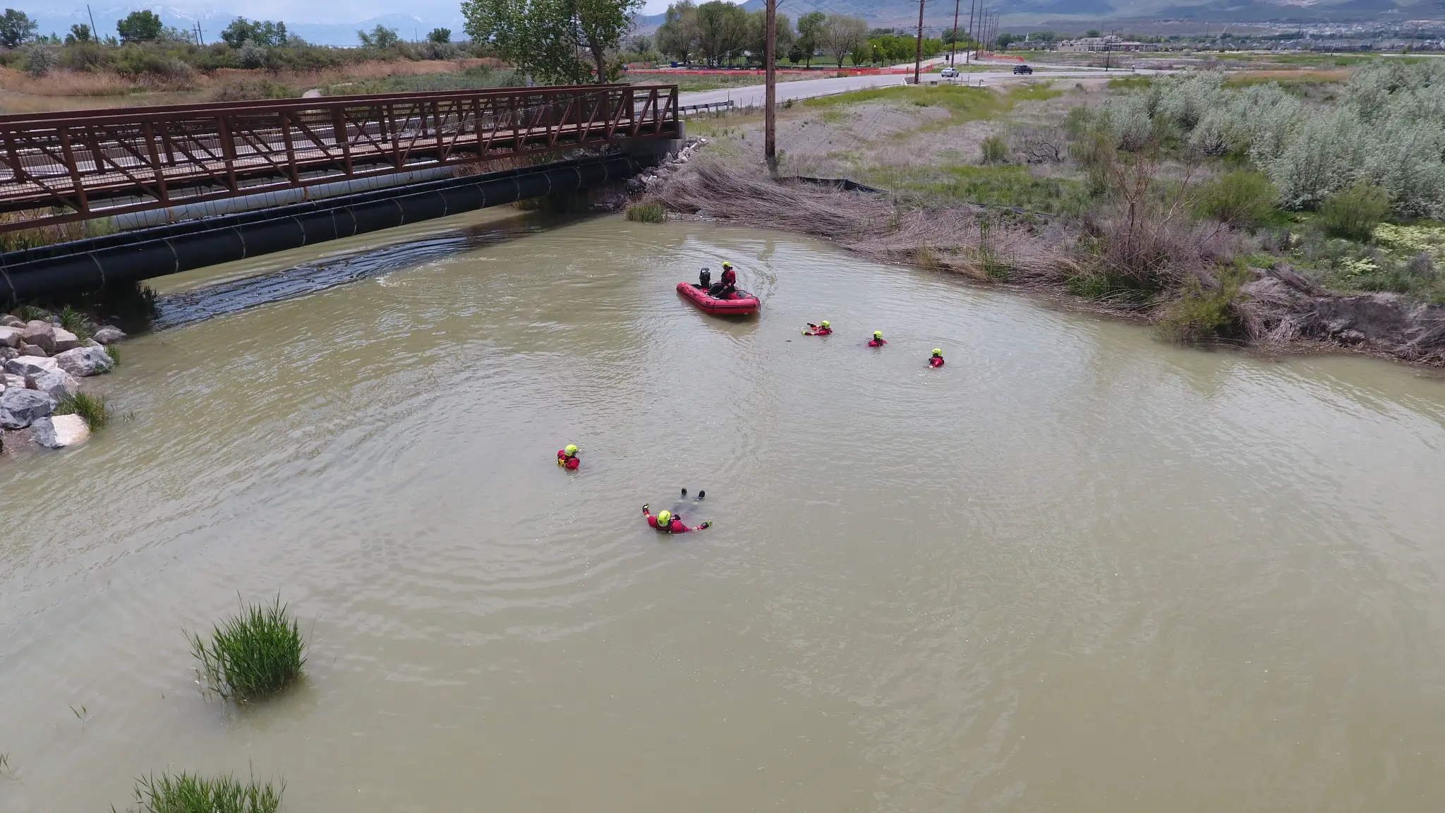 Surface water training - multiple swimmers and inflatable boat