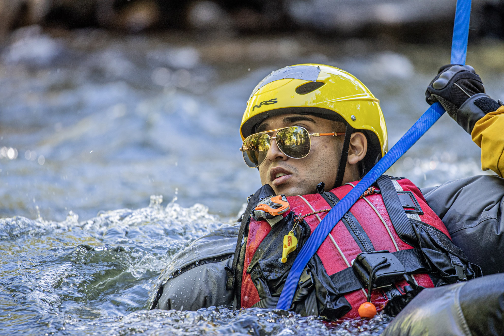 Swiftwater operations training - tethered swimmer in current