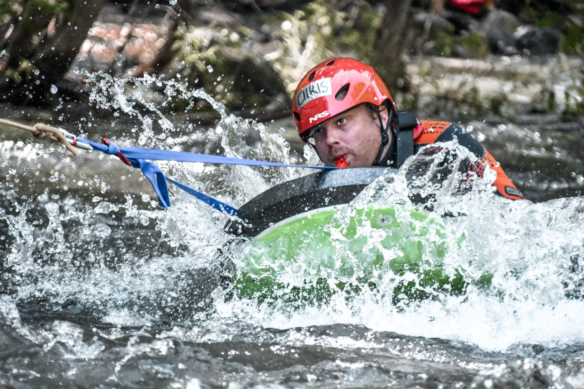 Swiftwater rescue training - tethered swimmer in rapids